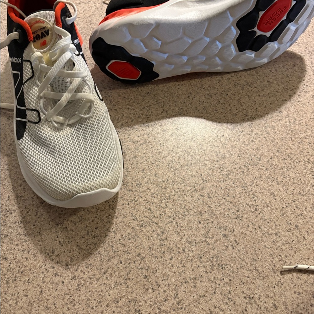 New Balance White and Black Sneakers with Red Accents